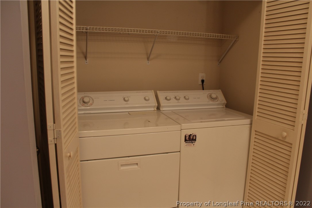 1925 Sardonyx Road, Unit 4 Fayetteville, NC 28303 - Photo 11 of 20 a utility room with dryer and washer