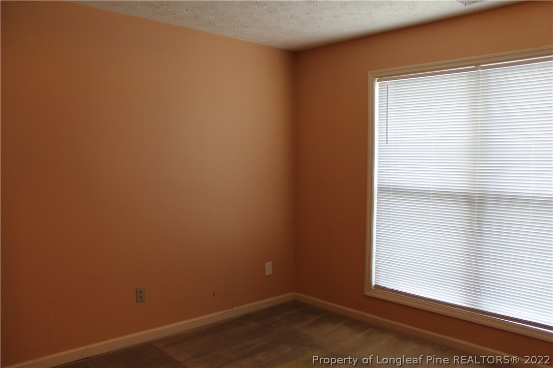 1925 Sardonyx Road, Unit 4 Fayetteville, NC 28303 - Photo 12 of 20 an empty room with a window