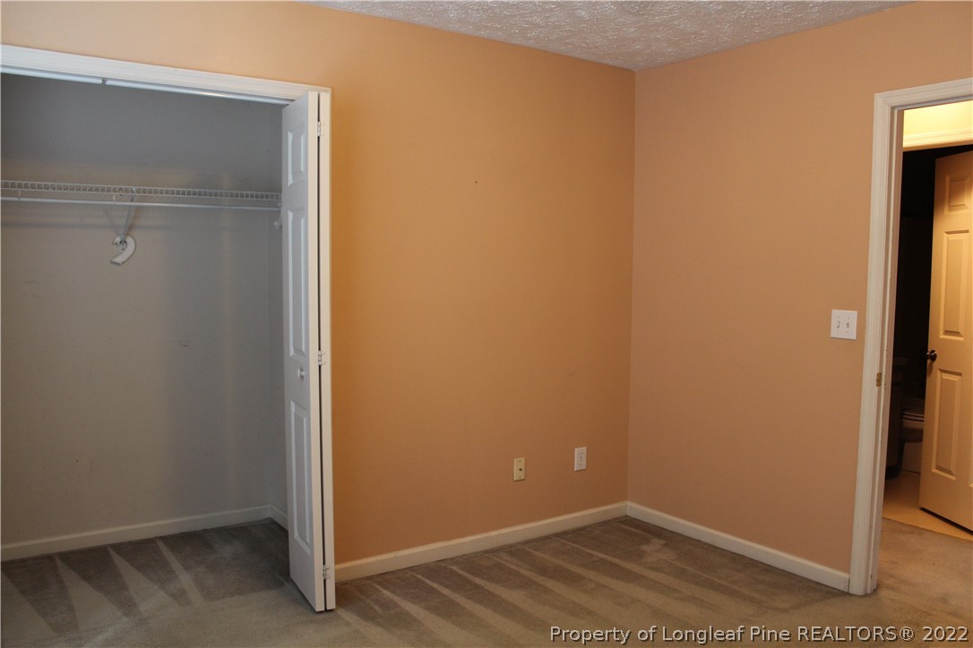 1925 Sardonyx Road, Unit 4 Fayetteville, NC 28303 - Photo 13 of 20 a view of small space with wooden floor