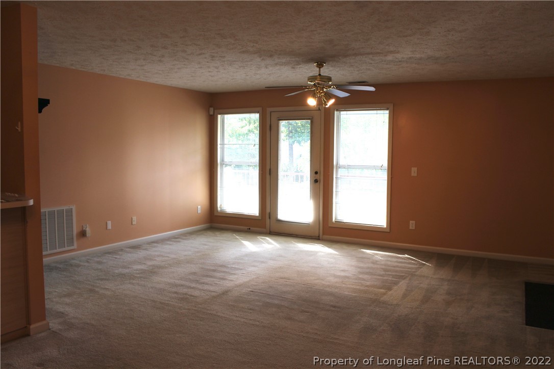 1925 Sardonyx Road, Unit 4 Fayetteville, NC 28303 - Photo 2 of 20 a view of an empty room with a window