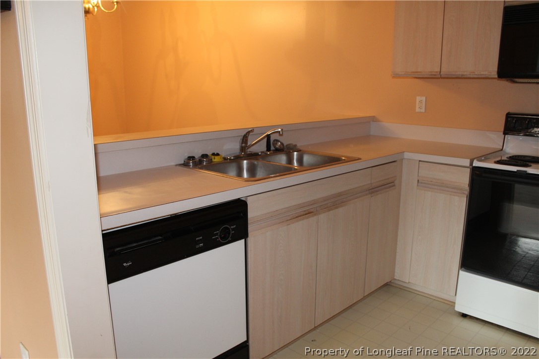 1925 Sardonyx Road, Unit 4 Fayetteville, NC 28303 - Photo 9 of 20 a utility room with dryer and washer
