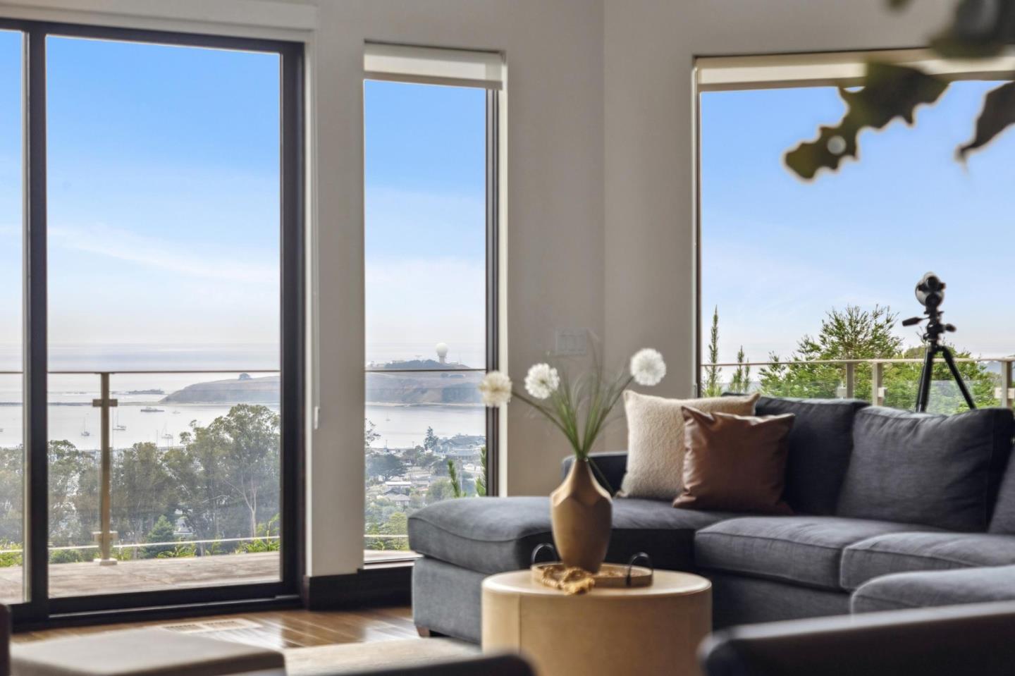 243 Del Monte Road El Granada, CA 94019 - Photo 16 of 66 a living room with furniture and a window