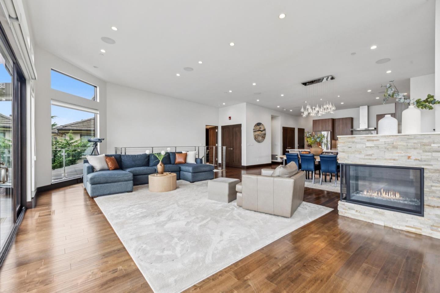 243 Del Monte Road El Granada, CA 94019 - Photo 18 of 66 a living room with furniture and a fireplace