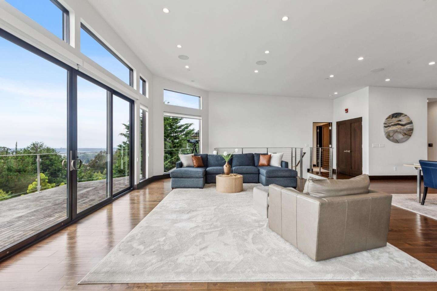 243 Del Monte Road El Granada, CA 94019 - Photo 19 of 66 a living room with couches and a flat screen tv