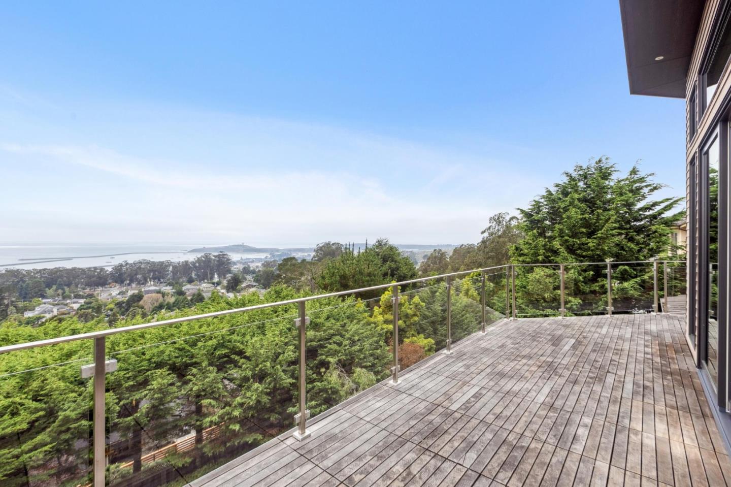 243 Del Monte Road El Granada, CA 94019 - Photo 23 of 66 a view of a balcony with a yard