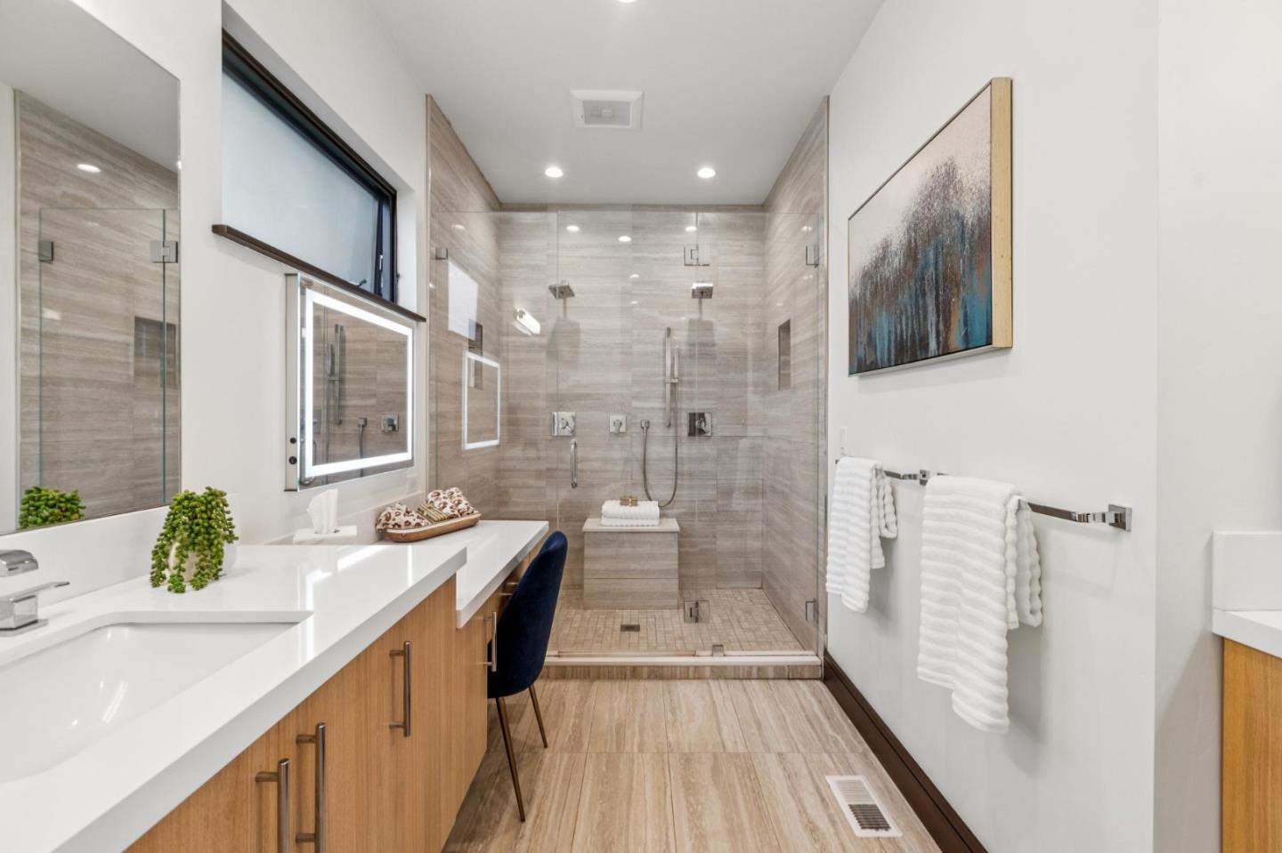 243 Del Monte Road El Granada, CA 94019 - Photo 28 of 66 a spacious bathroom with a granite countertop sink mirror and a shower