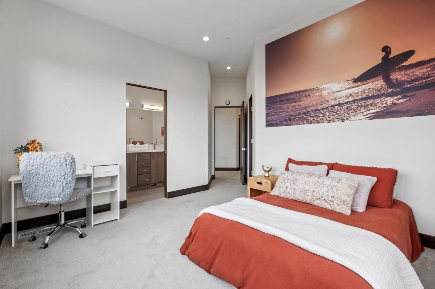 243 Del Monte Road El Granada, CA 94019 - Photo 44 of 66 a bedroom with furniture and a chair