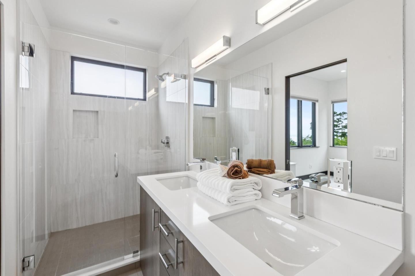 243 Del Monte Road El Granada, CA 94019 - Photo 46 of 66 a bathroom with a sink and a mirror