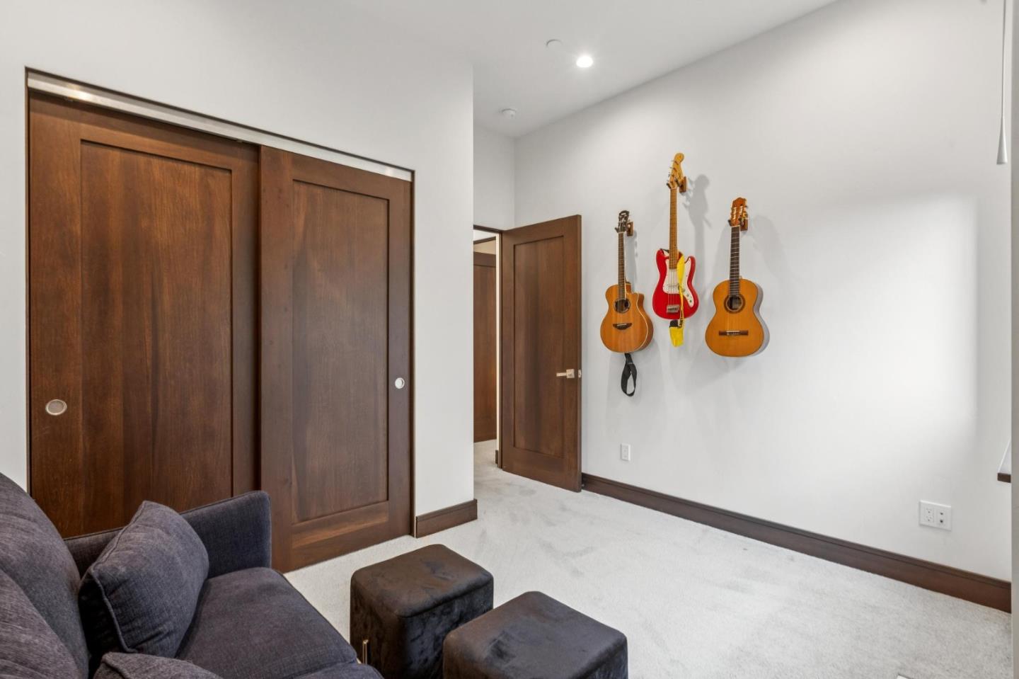 243 Del Monte Road El Granada, CA 94019 - Photo 49 of 66 a living room with furniture and a refrigerator