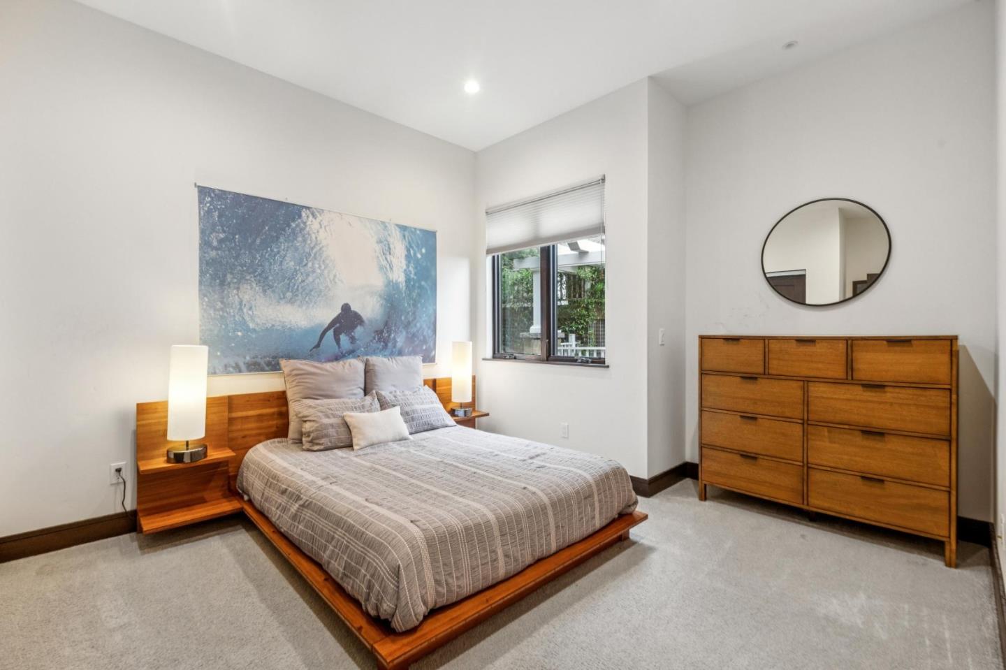 243 Del Monte Road El Granada, CA 94019 - Photo 51 of 66 a bedroom with a bed and a dresser