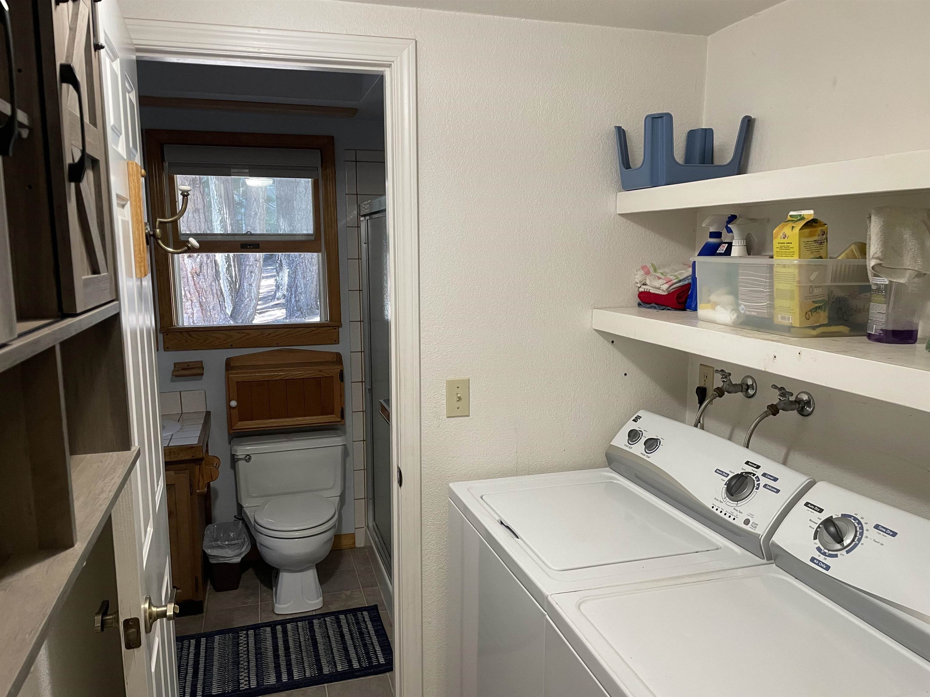 603 East Burnt Cedar Road Lake Almanor, CA 96137 - Photo 20 of 33 a hallway with washer and dryer