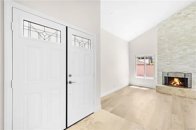 a view of a livingroom with a fireplace