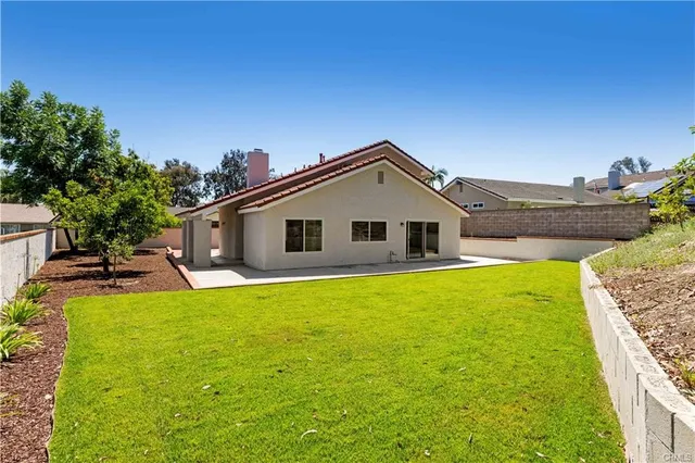 a house view with a outdoor space
