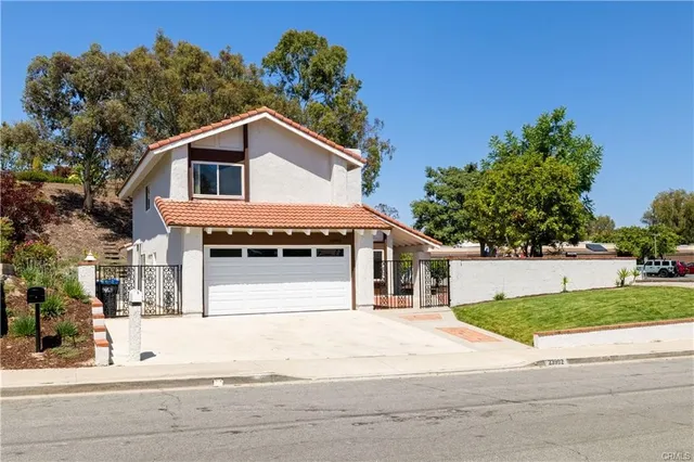 a view of a house with a garage