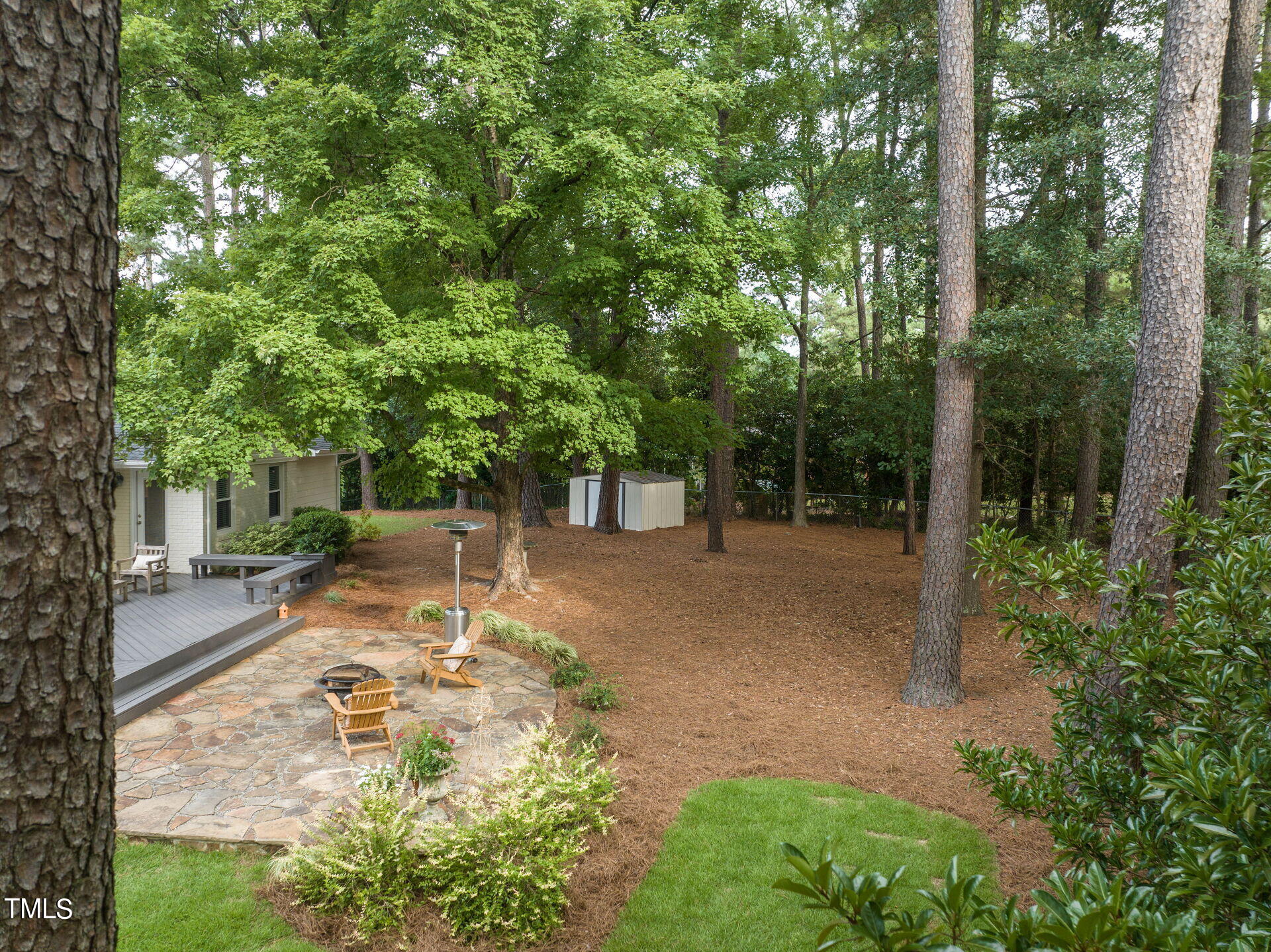3510 Wordsworth Place Raleigh, NC 27609 - Photo 29 of 40 a view of a backyard with large trees
