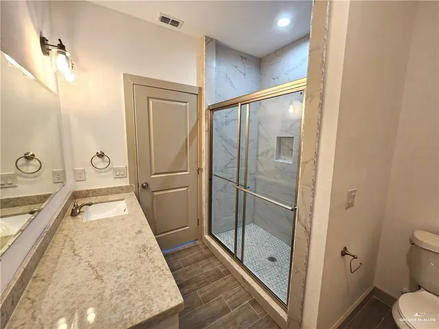 a bathroom with a tub and a shower