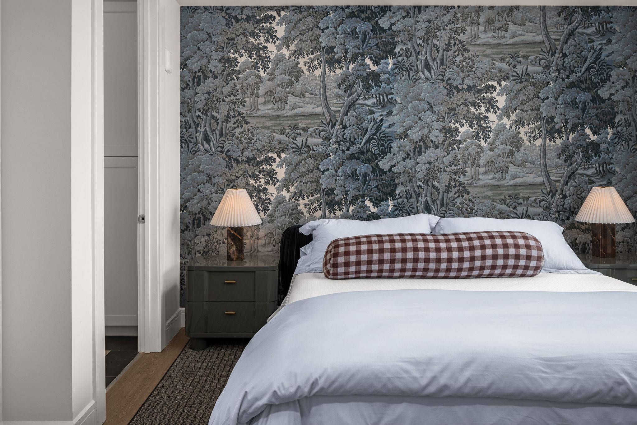 930 Commerce Street, Unit 19 Nashville, TN 37203 - Photo 12 of 40 a bedroom with a bed and wooden floor