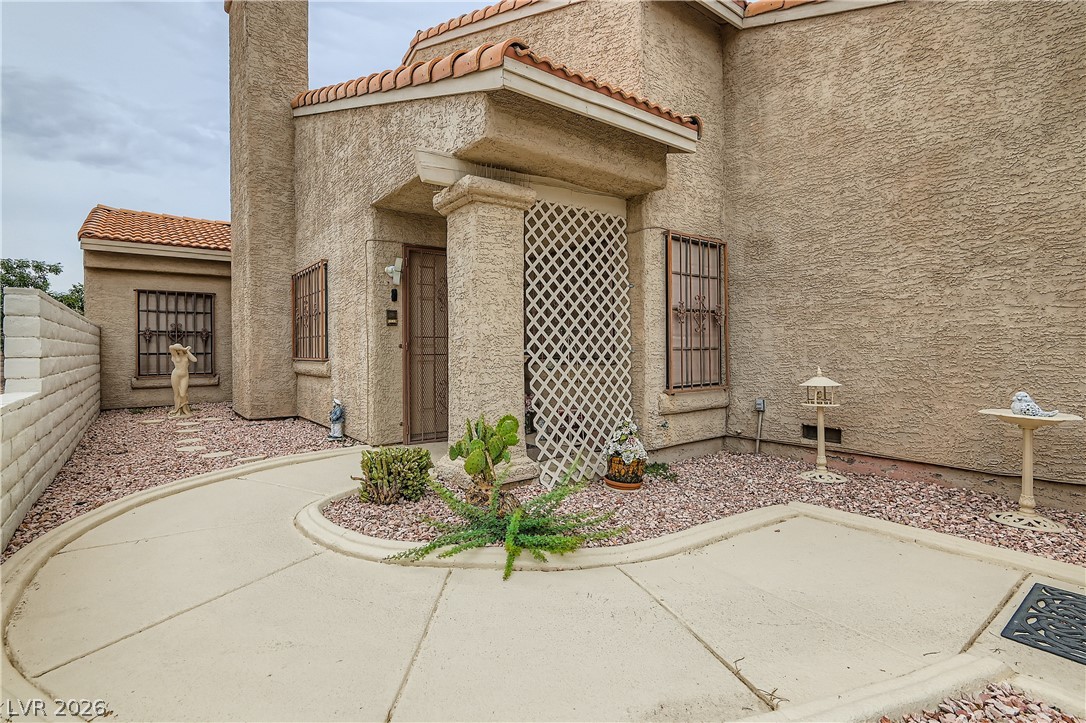 251 North Cimarron Road Las Vegas, NV 89145 - Photo 2 of 15 gated courtyard entrance