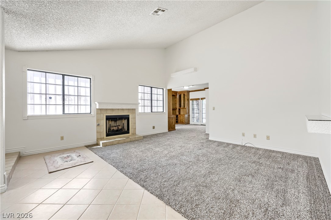 251 North Cimarron Road Las Vegas, NV 89145 - Photo 3 of 15 Spacious Front Room w/vaulted ceilings