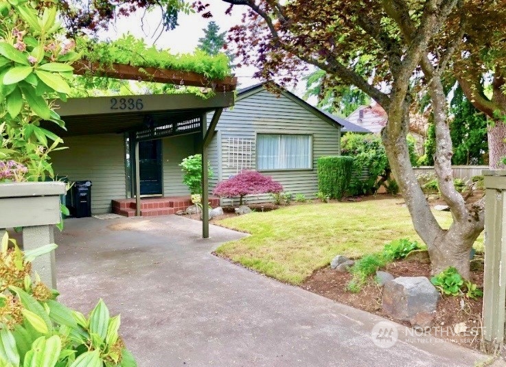 2336 North 135th Street Seattle, WA 98133 - Photo 1 of 17 a view of backyard of house with seating space