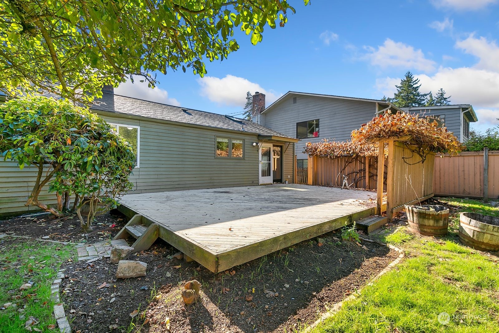 2336 North 135th Street Seattle, WA 98133 - Photo 15 of 17 a view of a house with a patio