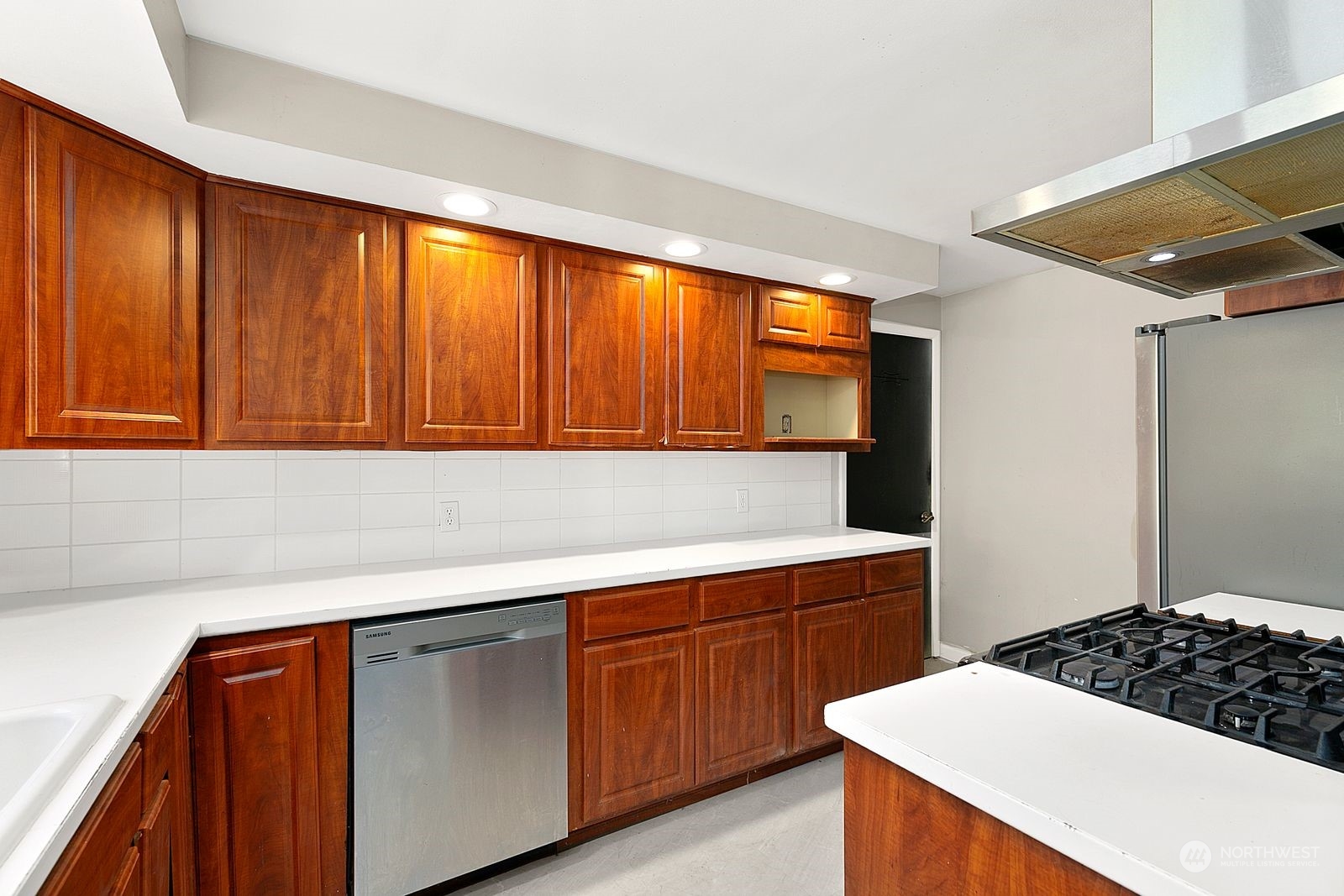 2336 North 135th Street Seattle, WA 98133 - Photo 8 of 17 a kitchen with a sink and cabinets