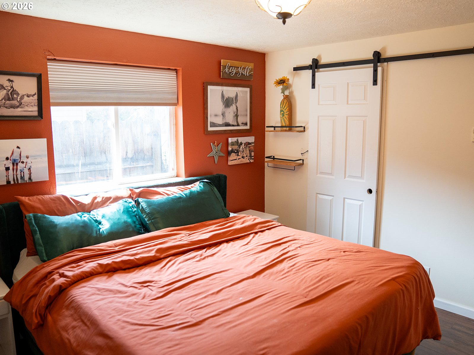 1923 Southwest 20th Street Redmond, OR 97756 - Photo 12 of 17 a bedroom with a bed and a window