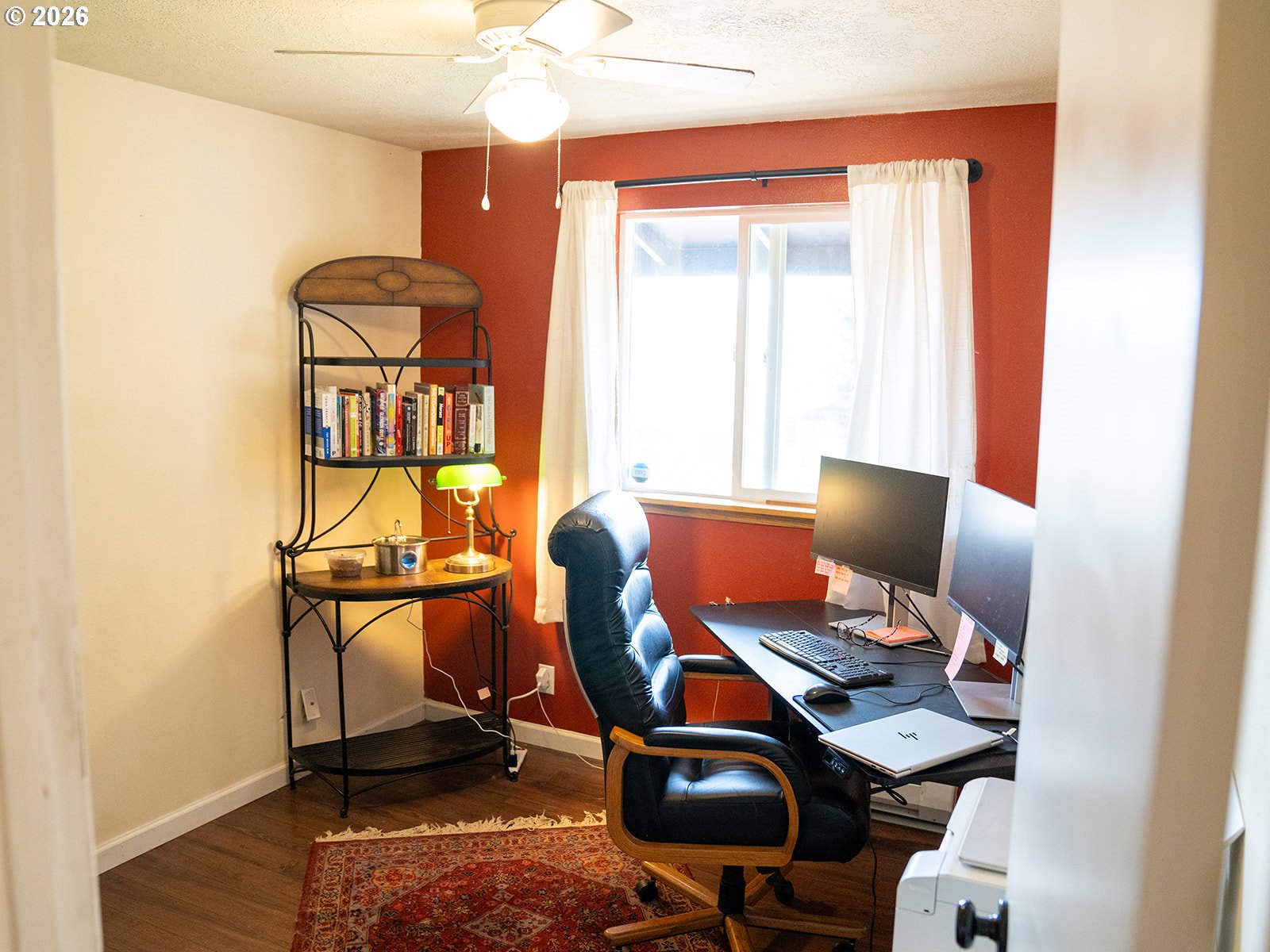 1923 Southwest 20th Street Redmond, OR 97756 - Photo 9 of 17 a workspace with furniture and a window