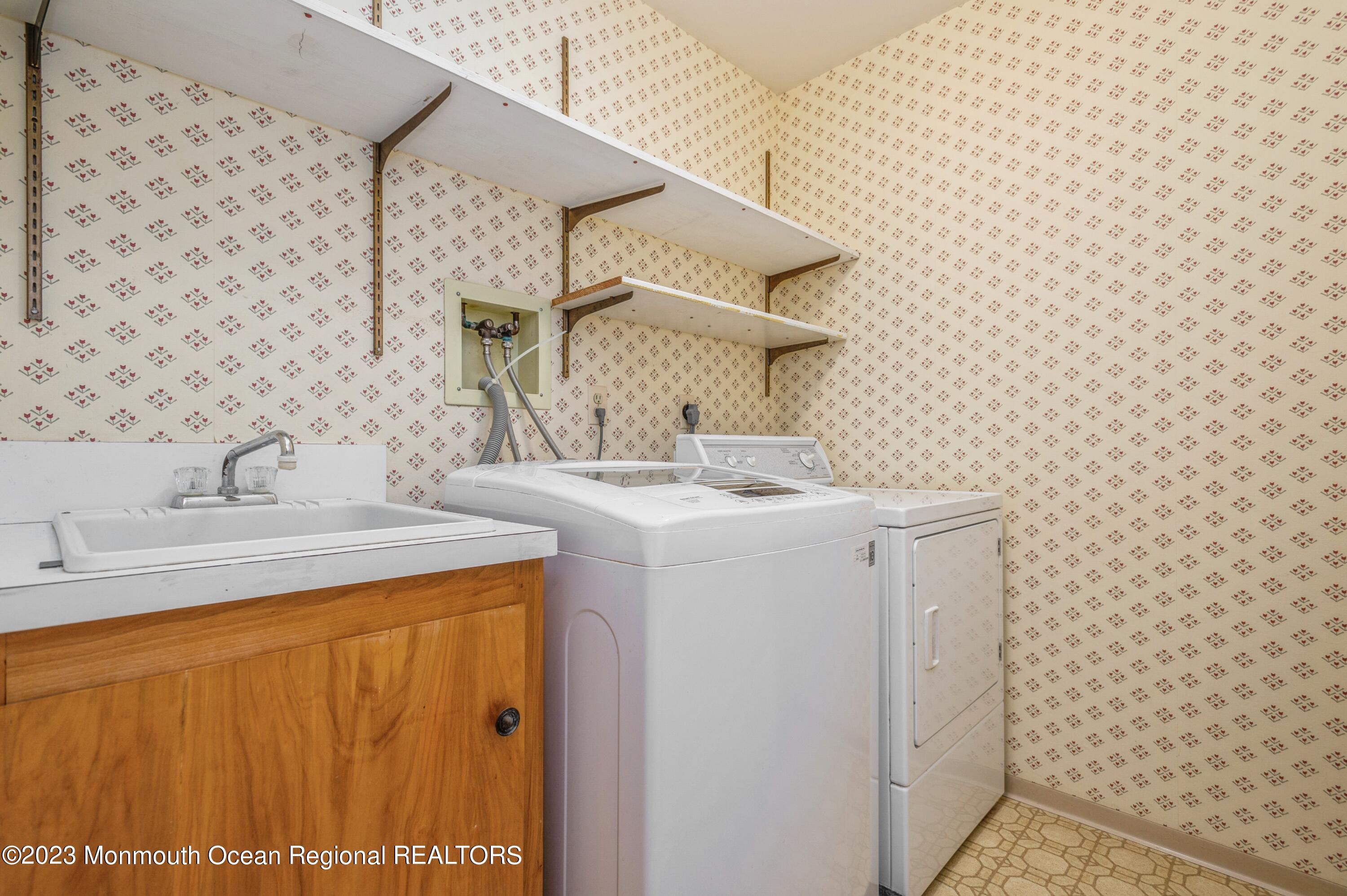 43 McCampbell Road Holmdel, NJ 07733 - Photo 15 of 25 a bathroom with a sink and a mirror