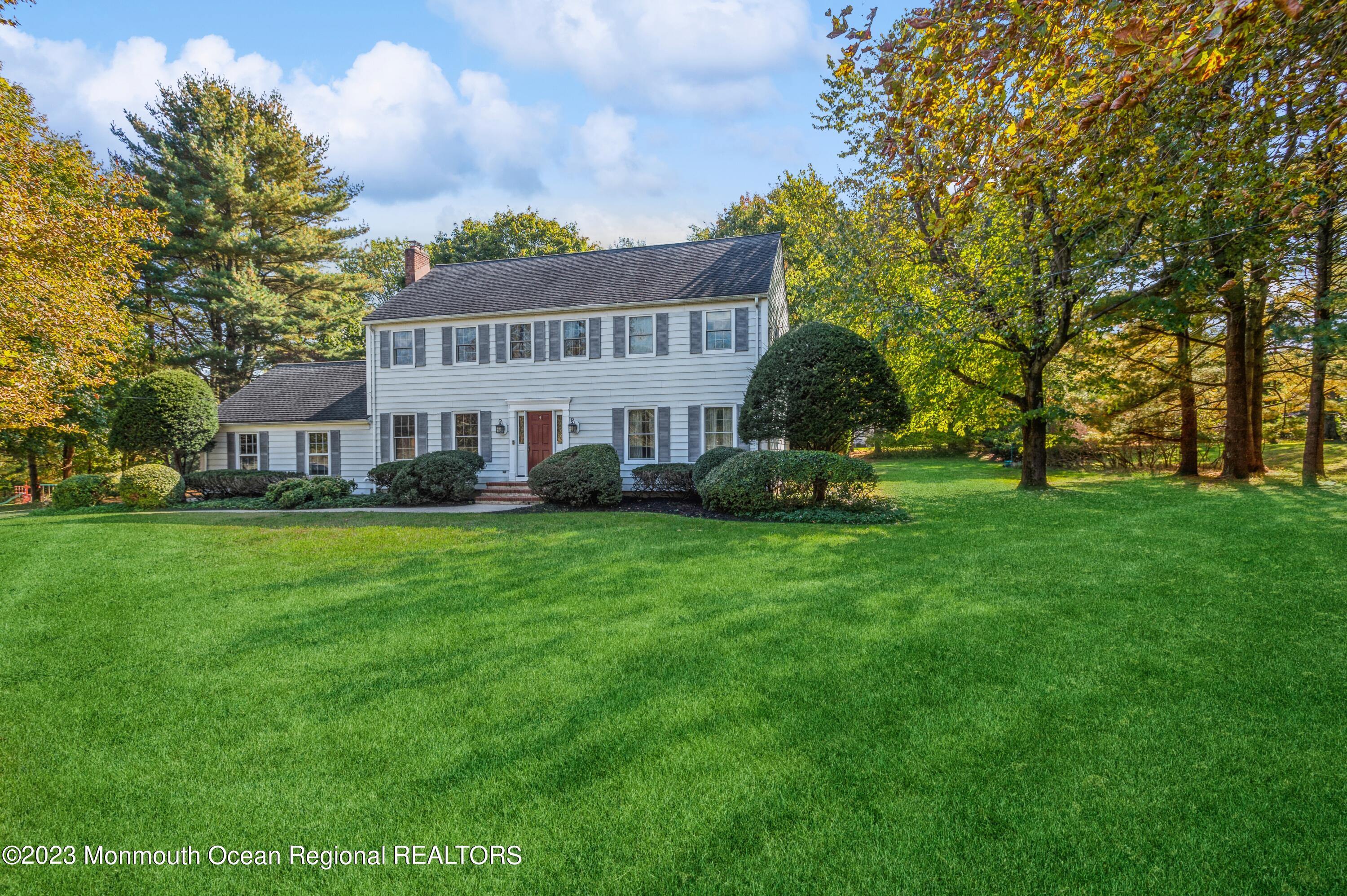 43 McCampbell Road Holmdel, NJ 07733 - Photo 2 of 25 a front view of a house with a yard
