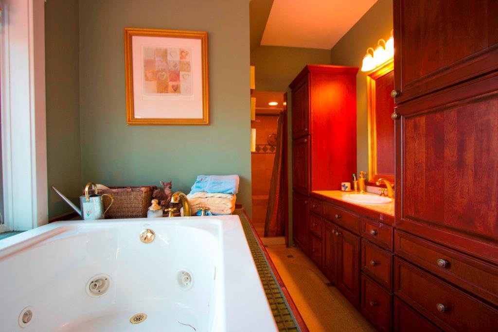 320 Paradise Road Bethel, ME 04217 - Photo 23 of 31 The large soaking tub overlooks the...
