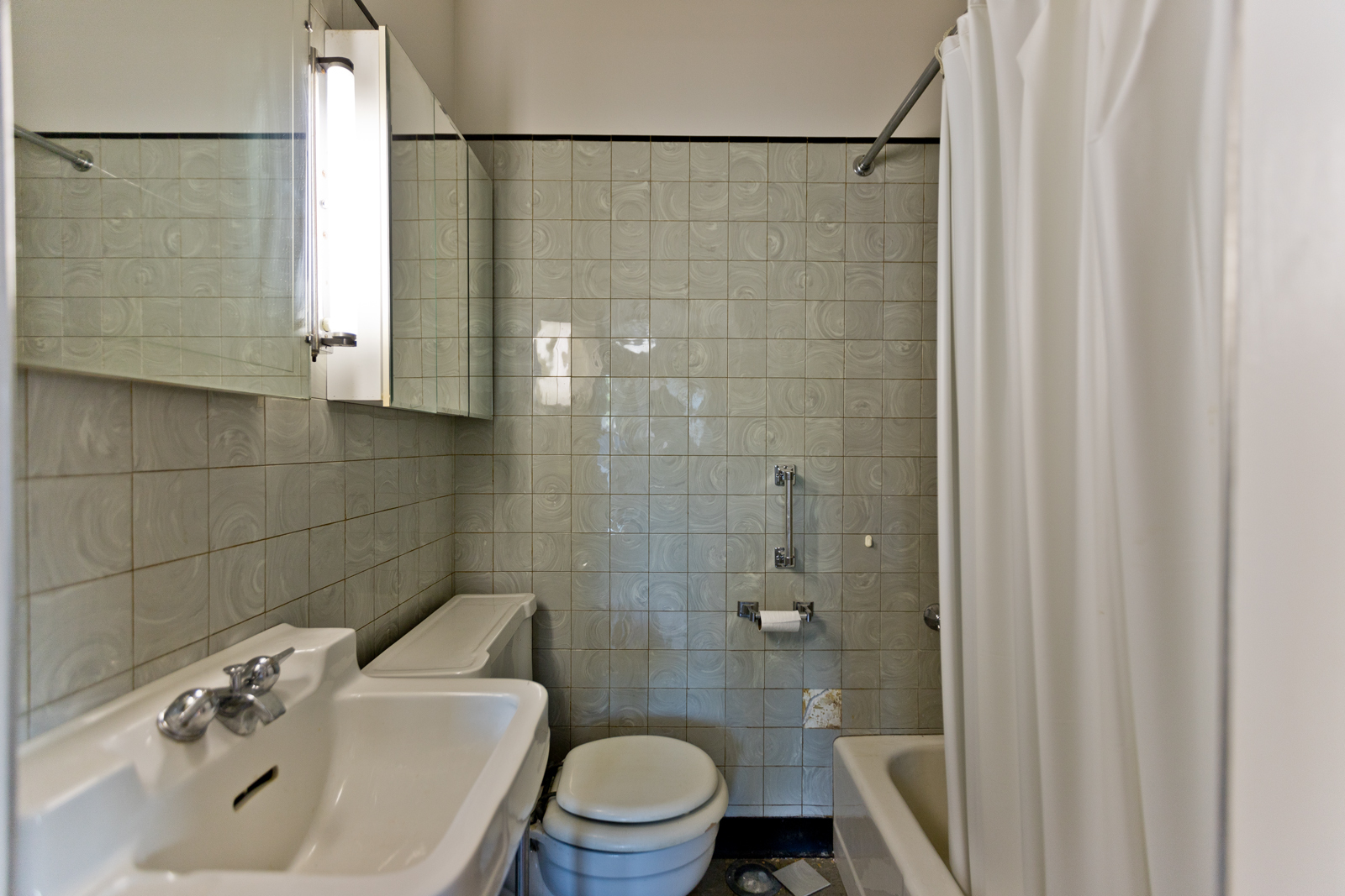 2950 Central Street, Unit 2 Evanston, IL 60201 - Photo 13 of 17 a bathroom with a sink and a toilet