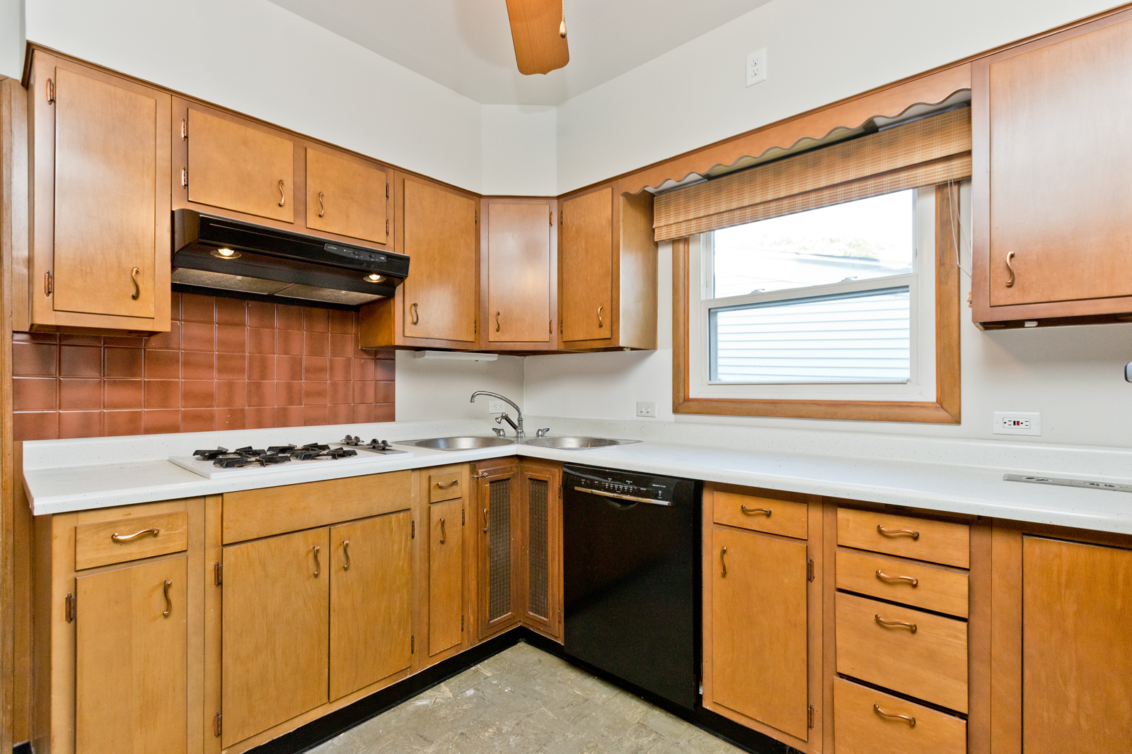 2950 Central Street, Unit 2 Evanston, IL 60201 - Photo 5 of 17 a kitchen with a sink stove and cabinets