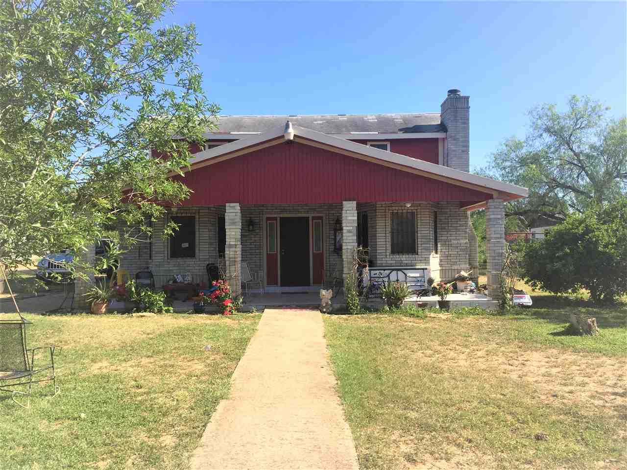 502 Rio Morava Rio Bravo, TX 78046 - Photo 1 of 20 a view of a house with swimming pool and sitting area