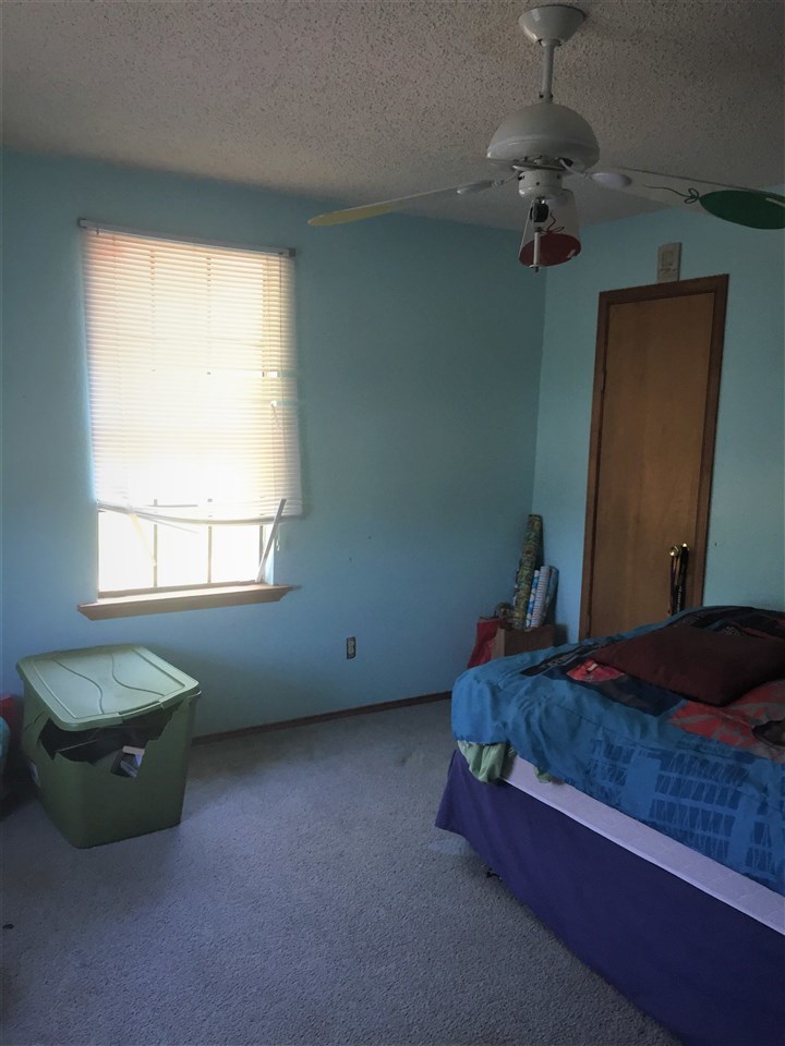 502 Rio Morava Rio Bravo, TX 78046 - Photo 18 of 20 a bed room with a bed and a window