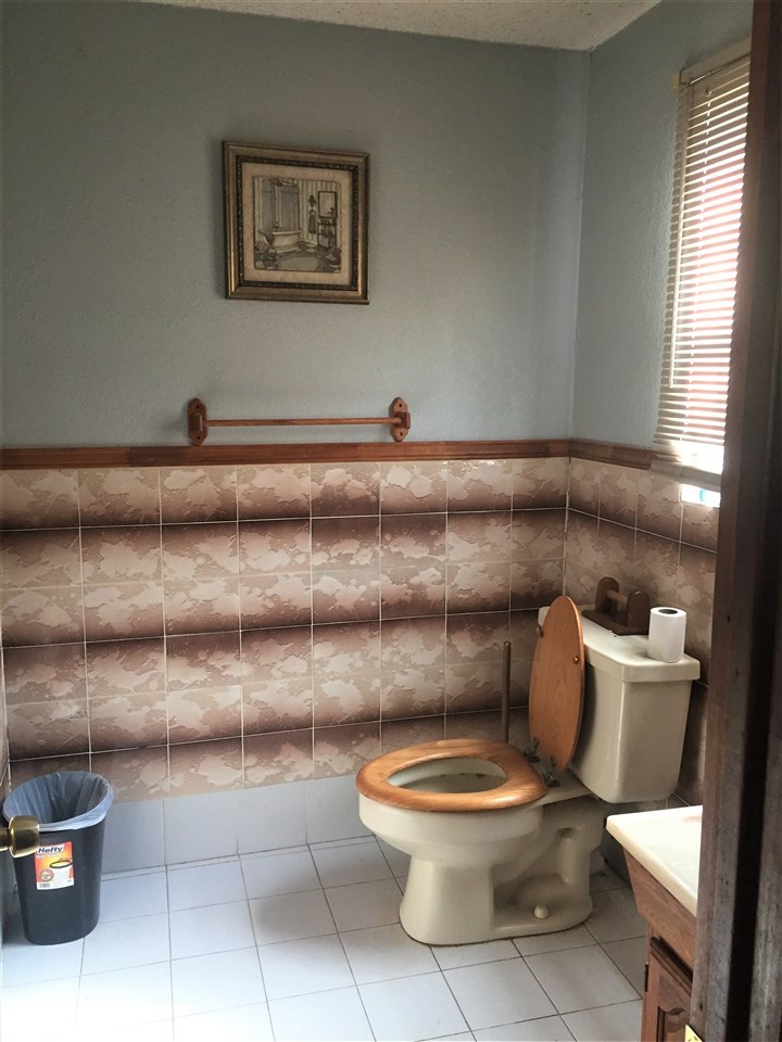 502 Rio Morava Rio Bravo, TX 78046 - Photo 20 of 20 a white toilet sitting next to a bathroom sink