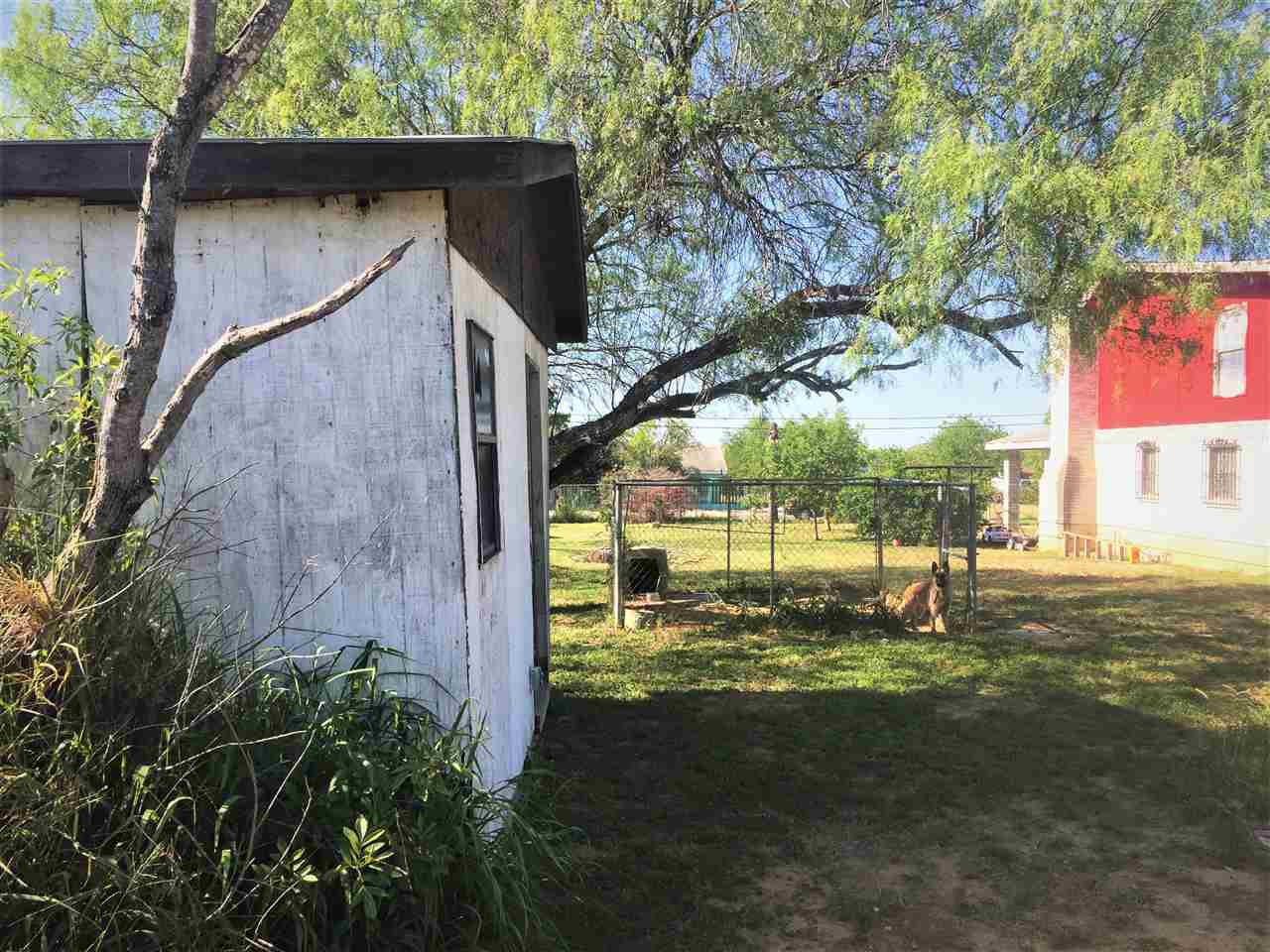 502 Rio Morava Rio Bravo, TX 78046 - Photo 4 of 20 a view of back yard of the house with a yard
