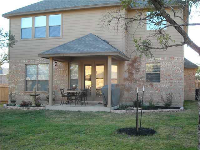 3313 Pine Needle Circle Round Rock, TX 78681 - Photo 11 of 12 a front view of a house with garden