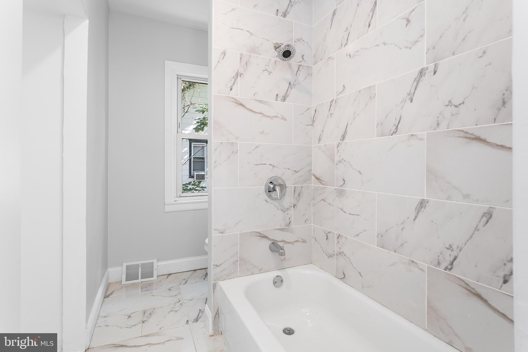 623 West 3rd Street Florence, NJ 08518 - Photo 24 of 36 a bathroom with bathtub and shower