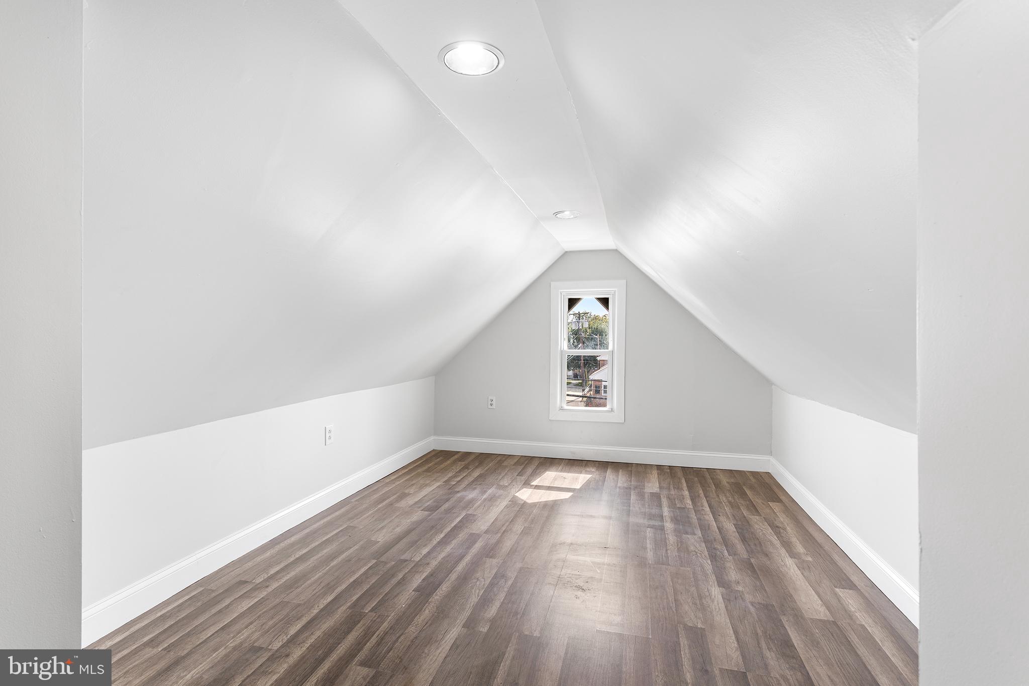 623 West 3rd Street Florence, NJ 08518 - Photo 30 of 36 an empty room with wooden floor and windows