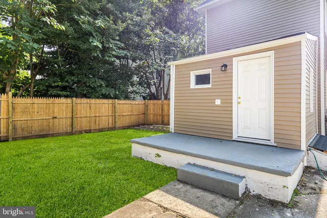a view of a backyard with plants