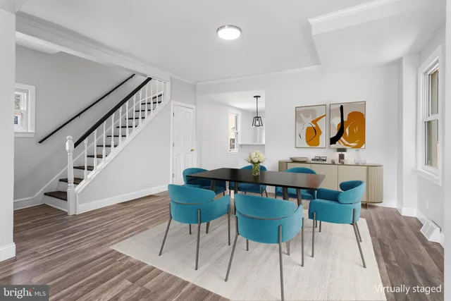 a view of kitchen with dining table and chairs