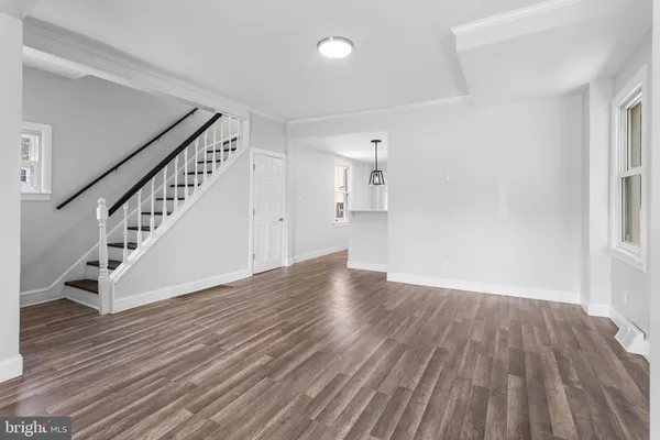 a view of entryway with wooden floor