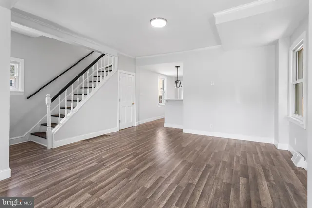 a view of entryway with wooden floor