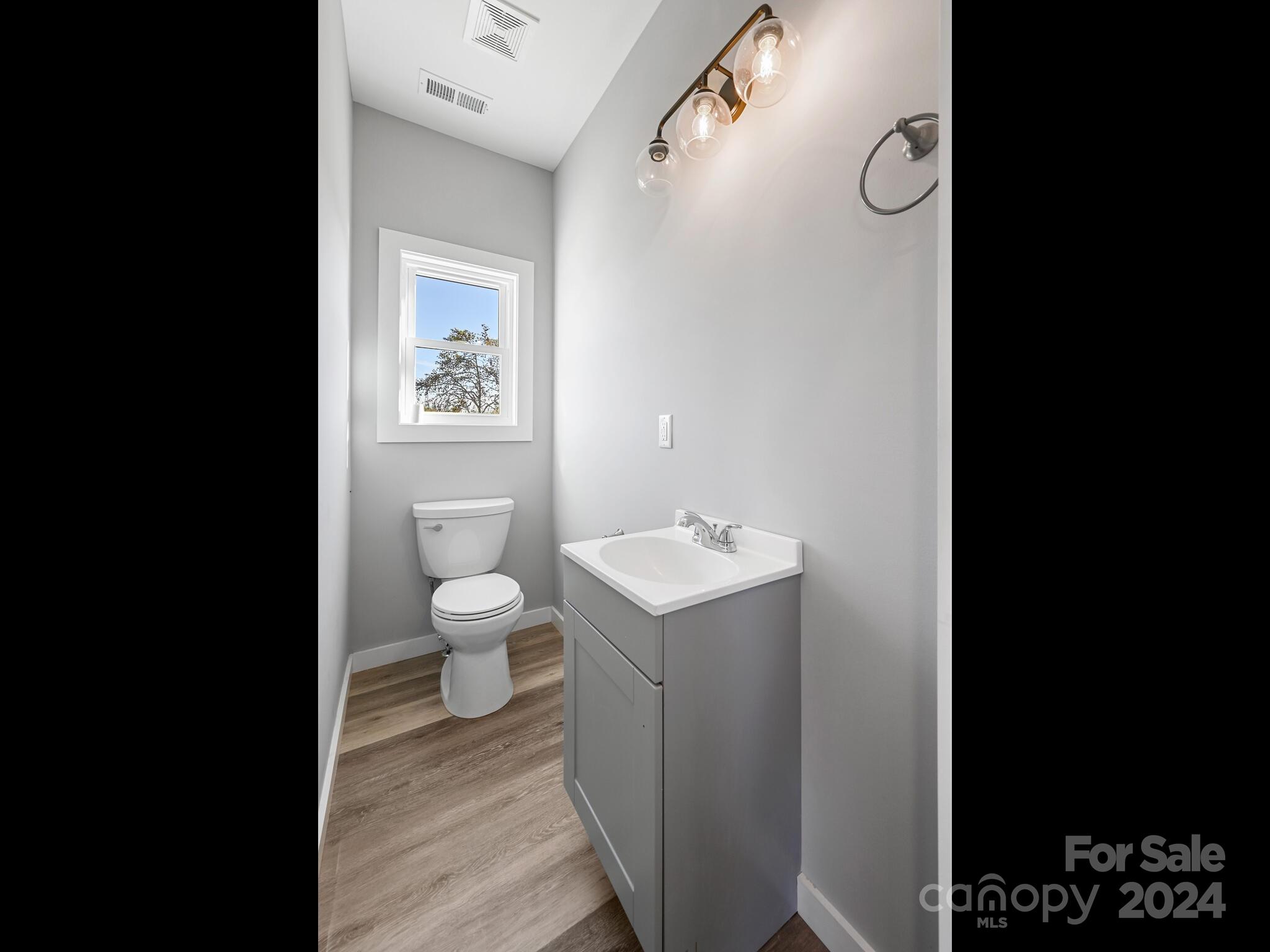 37 Sage Crest Loop Weaverville, NC 28787 - Photo 12 of 33 a view of a bathroom with a sink and a toilet