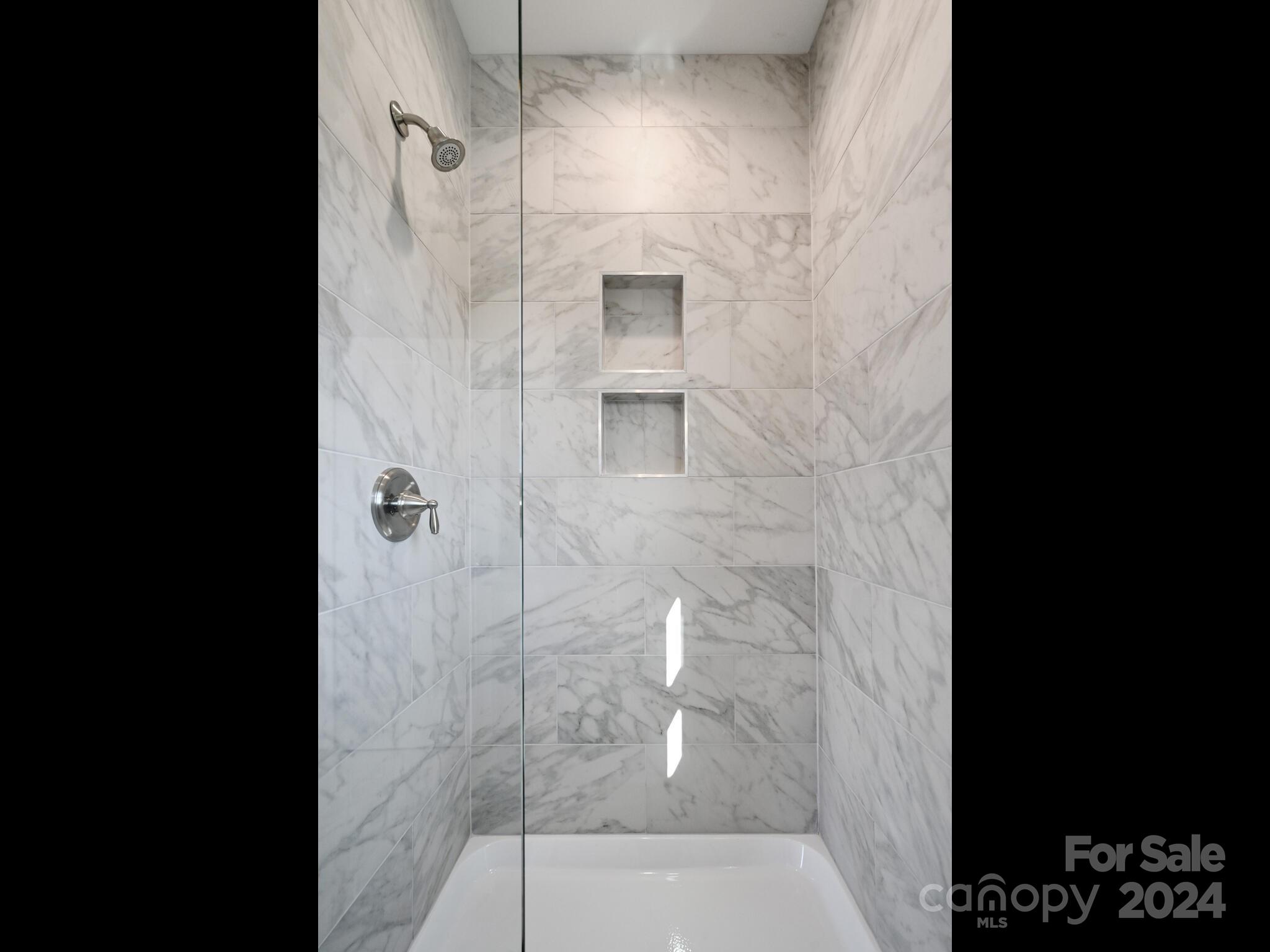 37 Sage Crest Loop Weaverville, NC 28787 - Photo 23 of 33 a bathroom with a shower and a sink