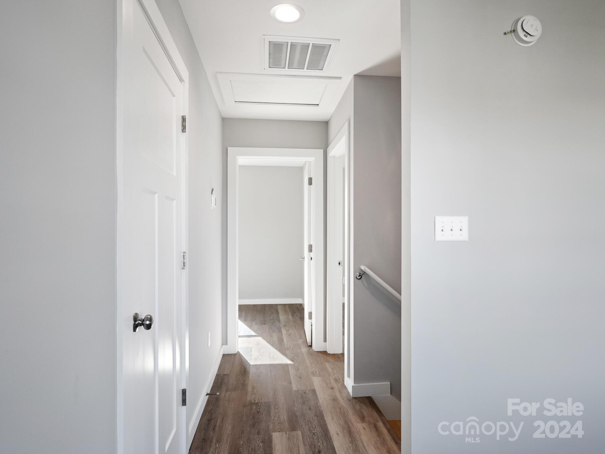 37 Sage Crest Loop Weaverville, NC 28787 - Photo 30 of 33 a view of a hallway with wooden floor and closet area