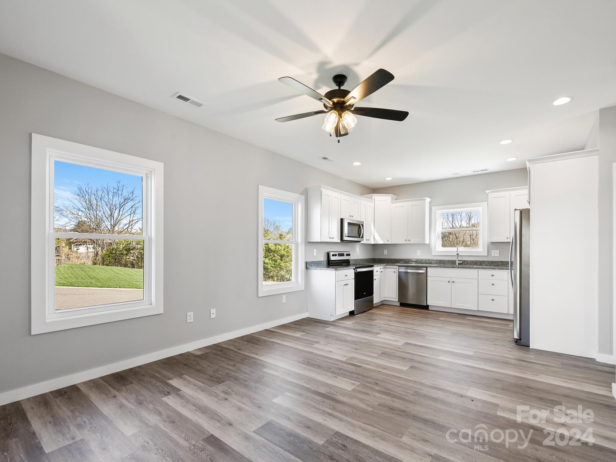37 Sage Crest Loop Weaverville, NC 28787 - Photo 9 of 33 a view of a kitchen with a sink cabinets and a window