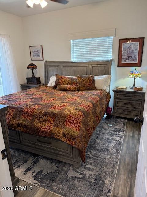 3933 Highway 260, Unit 242 Payson, AZ 85541 - Photo 4 of 30 a bed sitting in a bedroom next to a window