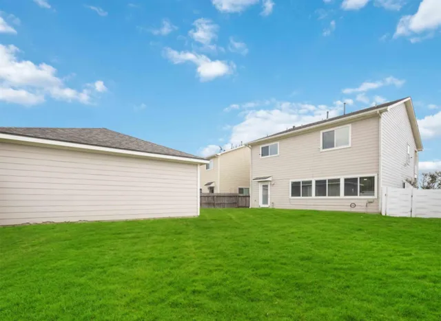 a house view with a garden space